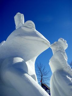 the snow sculptures are made to look like people