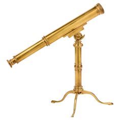 an antique brass telescope on a tripod stand, with the top turned down to look like it's from below