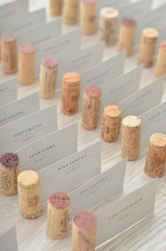 several wine corks are lined up on the table