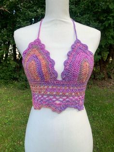 SIZE SMALL/MEDIUM Handmade crochet boho beach top. Made with acrylic yarn. Handwash gently and let air dry. Bohemian V-neck Halter Top For Summer, Crochet Lace V-neck Crop Top For Summer, Summer Festival V-neck Halter Top, Summer V-neck Crochet Crop Top, Bohemian V-neck Crop Top For Beach Season, Summer V-neck Crochet Top, Festival Crochet V-neck Crop Top, V-neck Crochet Top For Summer, Summer Crochet Lace Top Made Of Yarn