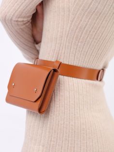 Handcrafted from smooth Italian leather, the Envelope Belt Bag will easily complete any outfit. A mix of style and practicability, the piece can be worn with a bodycon dress or oversized blazer for a chic look. With a modern and minimalist aesthetic, the adjustable belt allows for a customized fit while the slim envelope bag comfortably sits around the waist. Generous in size, it can securely hold your phone, wallet or other essential items. Waist Bag Size: Height- 11 cm, Width- 17.5 cm, Depth – Diy Leather Belt Bag, Belt Bag Diy, Diy Leather Belt, Harness Bag, Dog Accesories, Double Belt, Micro Bag, Leather Belt Bag, Belt Bags