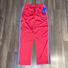 Pink And Blue Women’s Track Pants From Adidas. Brand New With Tags! Adidas Wide Leg Bottoms For Spring, Sporty Pink Straight Leg Pants, Adidas Pink Bottoms For Summer, Adidas Stretch Wide Leg Bottoms, Sporty Pink Straight Leg Bottoms, Pink Athleisure Trousers, Adidas Blue Relaxed Fit Bottoms, Adidas Fitted Sweatpants For Spring, Adidas Stretch Sweatpants For Spring