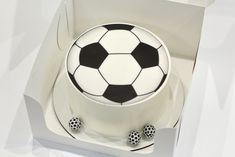 a cake in the shape of a soccer ball