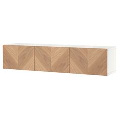 the sideboard is made out of wood and white