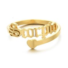 a gold ring with the word love spelled in cursive font and a heart