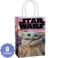 a star wars baby yoda bag with an image of the child's face on it