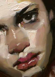 a painting of a woman's face is shown in this close up photo,