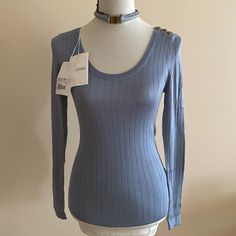 No Lowball Offers! 100% Authentic. Brand New With Tags And Extra Button. Valentino Silk Knitted Sweater/Blouse Size- S Color- Blue Length-25”/ 63.5 Cm Sleeves- 25”/63.5 Cm Stretchy Knitted Fabric. Right Shoulder 3 Buttons Closure. Scooped Neck Line. Necklace Sold Separately. Due To Pandemic All Sales Are Final. Please Review Photos And Ask Questions. Photos/ Video Will Be Taken Prior To Shipping To Avoid Any Accusations Or Damages. Light Blue Fine Knit Top For Spring, Blue Fine Knit Top For Winter, Chic Blue Knit Top For Layering, Light Blue Tops For Winter Layering, Trendy Blue Long Sleeve Top For Fall, Light Blue Ribbed Sweater For Spring, Elegant Light Blue Sweater For Spring, Long Sleeve Blue Knit Top For Winter, Blue Long Sleeve Knit Top For Winter