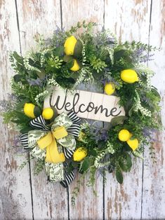 a welcome wreath with lemons and greenery