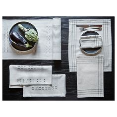 an assortment of kitchen utensils and napkins