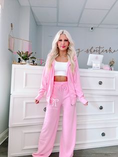 We are so excited to release our newest merch item! The Sassy Bow Sweatpants in Bubblegum pink feature a white bow and the text Sassy Shortcake. These wide leg sweats feature an elastic waistband and pockets for maximum comfort, and feature a soft micro-fleece lining. Rep your favorite brand in these super cute pants!! Also available in blue and gray. Wear it as a set! Pair it with the matching bubblegum pink bow zip up. fits: true to size, model wearing a size small content: 100% polyester care Trendy Pink Sweatpants For Lounging, Pink Cotton Sweatpants For Leisure, Pink Athleisure Sweatpants For Lounging, Pink Athleisure Sweatpants For Leisure, Pink Athleisure Pants For Lounging, Pink Sweatpants For Lounging, Sporty Pink Loungewear Pants, Sporty Pink Lounge Pants, Pink Sweatpants For Spring Leisure