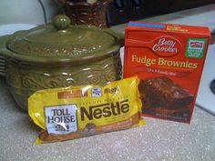 ingredients for fudge brownies laid out on the counter next to a cookie tin