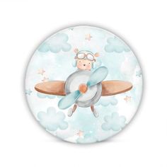 a round glass plate with a cartoon character on the front and bottom, in the shape of an airplane