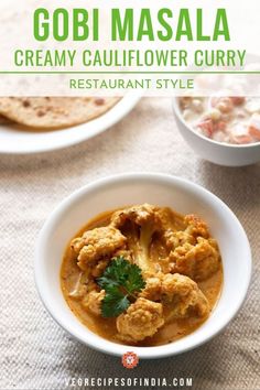 gobi masala creamy cauliflower curry in a bowl with pita bread on the side