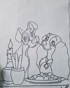 a drawing of two dogs in front of a candle