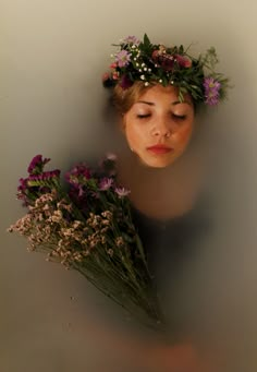 a woman with flowers in her hair