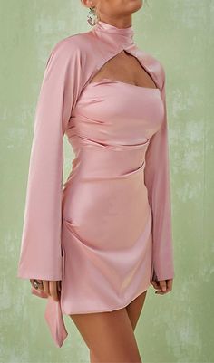 Our Satin Mini Dress In Pink is so fun and flirtatious, making it perfect for romantic date nights. Made from our lustrous silk satin, the dress is cut on the bias and has so many pretty details. The cross front halter shape is so flattering and creates a skin baring open front with a beautifully draped cowl neckline, fitted with our incredible corsetry boning to really cinch the waist. Material: Light Silky Satin (100% Polyester) Invisible zipper opening at the back Stretch Factor: Low Stretch Pink Satin Dress Party, 1 Shoulder Pink Dress, Satin Long Sleeve Short Dress, Silk Date Night Dress, Pretty Dresses Mini, Pink Silky Dress, Chic Cheap Pink Dresses, Cheap Chic Pink Dress, Simple Pink Dress With Sleeves