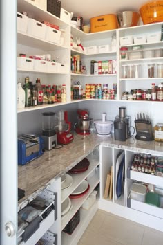 an organized pantry with lots of food items