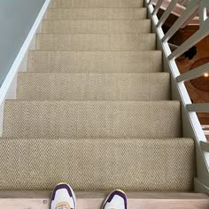 someone's shoes are sitting on the stairs