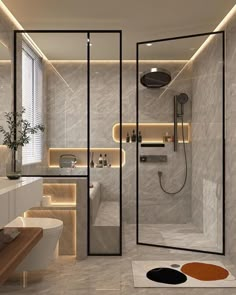 a modern bathroom with marble walls and flooring, including a walk - in shower