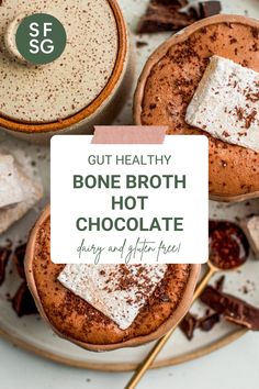 two hot chocolate mugs with whipped cream on top and the words gutt - healthy bone broth hot chocolate