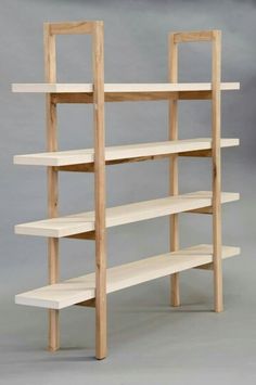 three different views of the same shelving unit, each with four shelves and one without