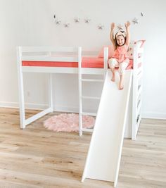 Bed, storage and play space in one?  Yes, please!  Our twin loft bed with slide features a contemporary design to make your child's room more fun and organized.  This loft bed is a great space saver, freeing up lots of floor space and combining the fun of a slide with shelving for an organized play area. Our loft bed is designed with safety in mind.  It meets CPSC safety requirements with guard rails at the top to keep your child safe throughout the night.  The 2.4 inch thick posts, make this bu Shelving Bed, Kids Loft Bed, Loft Bed With Slide, Standing Bookshelf, Kids Loft, Twin Size Loft Bed, Kids Loft Beds, Bunk Beds With Storage, Twin Loft Bed