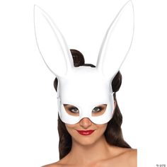 a woman wearing a white bunny mask with long brown hair