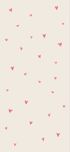 pink hearts are flying in the air against a white background with red dots on it