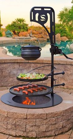 an outdoor bbq grill with food on it next to a swimming pool in the background