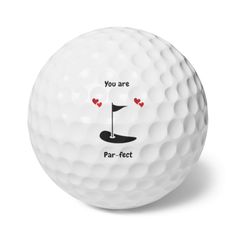 a golf ball with the words you are par - fect on it