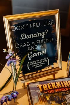 a sign that says don't feel like dancing? grab a friend and a game