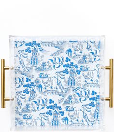 From Tart by Taylor&#x2C; this large tray features:Make your next gathering more festive with this Chinoiserie Large Tray&#033; Combining a chic blue and white chinoiserie print with sturdy acrylic and glowing brass handles&#x2C; it's perfect for serving up drinks or holding your favorite trinkets - with style&#033; (Or just put your feet up - hey&#x2C; we won't judge&#033;)Made of acrylicBlue and white chinoiserie printGold handle Server Tray, Chinoiserie Print, Blue And White Chinoiserie, Serveware Entertaining, Chinoiserie Style, Large Tray, Gold Handles, Acrylic Tray, Brass Handles