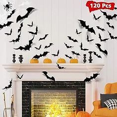 a living room decorated for halloween with bats flying over the fireplace and on the mantle