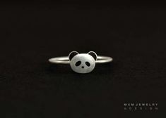 Panda: one of our favorite, it is super cute and adorable. This little Panda ring will made you happy everyday. Model is wearing a size 5. --- S I Z E Panda: About 8mm (W) Ring Wire: 17 Gauge F I N I S H Brushed or Polished/Shiny M A T E R I A L 925 sterling silver --- Note: Brushed finish by time of wearing will become naturally shine. Panda Aesthetic, Panda Ring, Doctor Logo, Panda Things, Panda Outfit, Midi Rings Silver, Floral Wedding Ring, Stackable Rings Wedding, Eagle Ring