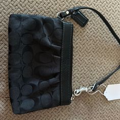 Amazing Condition . Never Used Black Travel Bag With Wrist Strap, Black Pouch Wristlet With Zipper Closure, Black Pouch Wristlet With Wrist Strap, Black Everyday Bags With Wrist Strap, Everyday Black Bags With Wrist Strap, Black Zipper Pouch Wristlet, Coach Black Wristlet With Zipper Pouch, Black Wristlet With Removable Pouch, Black Wristlet With Zipper Closure For Evening