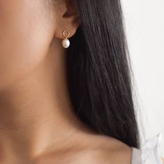 These earrings feature a simple sleek circle joined by a single oval pearl. Made of 14K gold filled materials and genuine freshwater pearls, these earrings are tarnish-resistant, water-resistant, and hypoallergenic. The circle measures 7mm while the pearl measures approximately 10mm. --------------------♥ PROMOS ♥-------------------- Want 10% off? Join the mailing list by visiting http://bit.ly/vedern . Just leave me a note at checkout if you have any problems applying discount codes. ---------- Dainty Pearl White 14k Gold Filled Pearl Earrings, Handmade Minimalist Pearl Earrings For Everyday, Minimalist Handmade Pearl Earrings For Everyday, Dainty Pearl White Earrings, Minimalist Pearl White 14k Gold-filled Earrings, Pearl White Minimalist 14k Gold-filled Earrings, Minimalist Pearl White 14k Gold Filled Earrings, Dainty 14k Gold-filled Pearl Charm Earrings, Handmade Minimalist Pearl Earrings