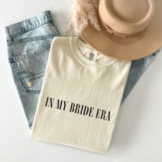 Comfort Colors Shirt, In My Bride Era Shirt, Bride To Be Gift, Bride Shirt, Fiancé Shirt, Fiancée Shirt, Eras Shirt, Concert Shirt, Mrs. W H Y - S H O P - W I T H - S W E E T T C A P R I ? We are a husband-and-wife team that designs and prints everything out of our home-based business in Georgia! What does this mean for you? Sometimes our turnaround times may be a little longer compared to other Etsy shops, but we promise that our product stands out above the rest. We pay attention to every deta Mrs To Be, In My Bride Era, Shirt Design Inspiration, Concert Shirts, Bride Shirts, Bride Gifts, Comfort Colors, Womens Clothing Tops, Colorful Shirts