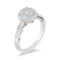 a white and yellow gold engagement ring with diamonds on the sides, set in two tone gold