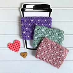 three crocheted coasters sitting next to each other