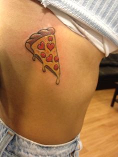 a woman with a pizza tattoo on her back