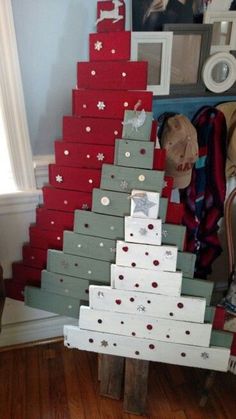 a christmas tree made out of wooden boxes