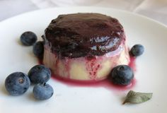 a dessert with blueberries on a white plate