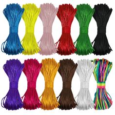 various colors of tassels on white background