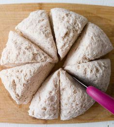 the bun is cut into eight pieces and ready to be served with a pink spatula