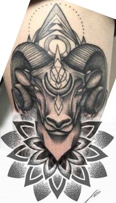 a ram tattoo on the back of a woman's leg with an intricate design