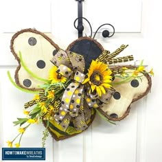 the front door is decorated with sunflowers and butterflies, as well as an iron hook