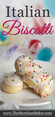 italian biscotti with white icing and sprinkles on a plate