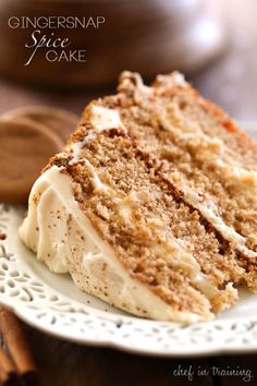 a slice of carrot cake on a white plate