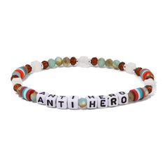 Embrace your inner popstar with our ANTI-HERO bracelet. Made with glass crystal beads and colorful polymer clay discs, it's a vibrant and playful addition to any wrist. Inspired by the iconic song, its stretch style fits pre-teens to young adults. Get ready to rock and roll! Sea Crystals, Hero Bracelet, Bead Letters, Beads Clay, Scout Bags, Denim Jewelry, Grace And Lace, Anti Hero, Word Bracelet